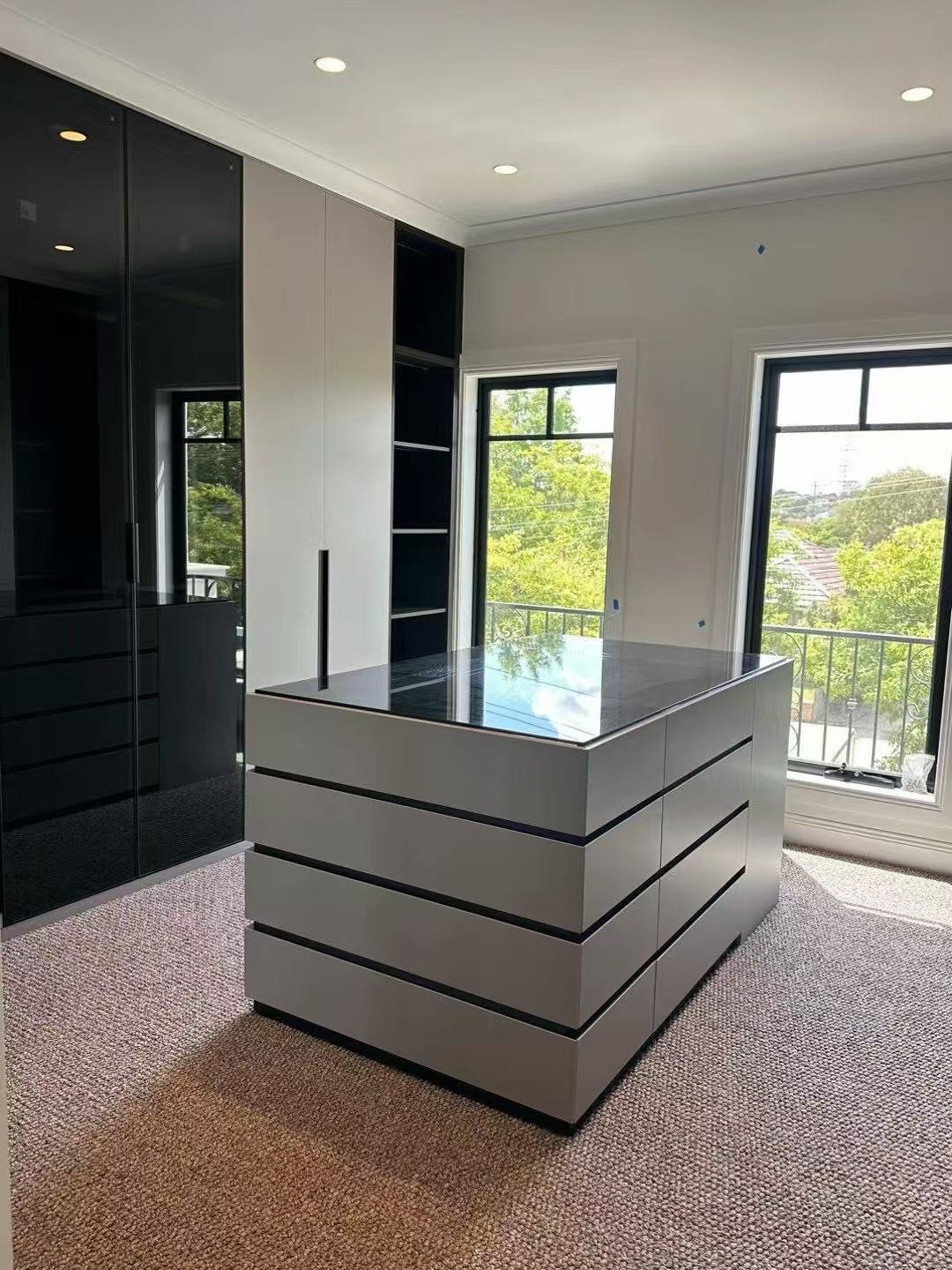 Custom walk-in wardrobe island and cabinetry by FormaMuse in Perth