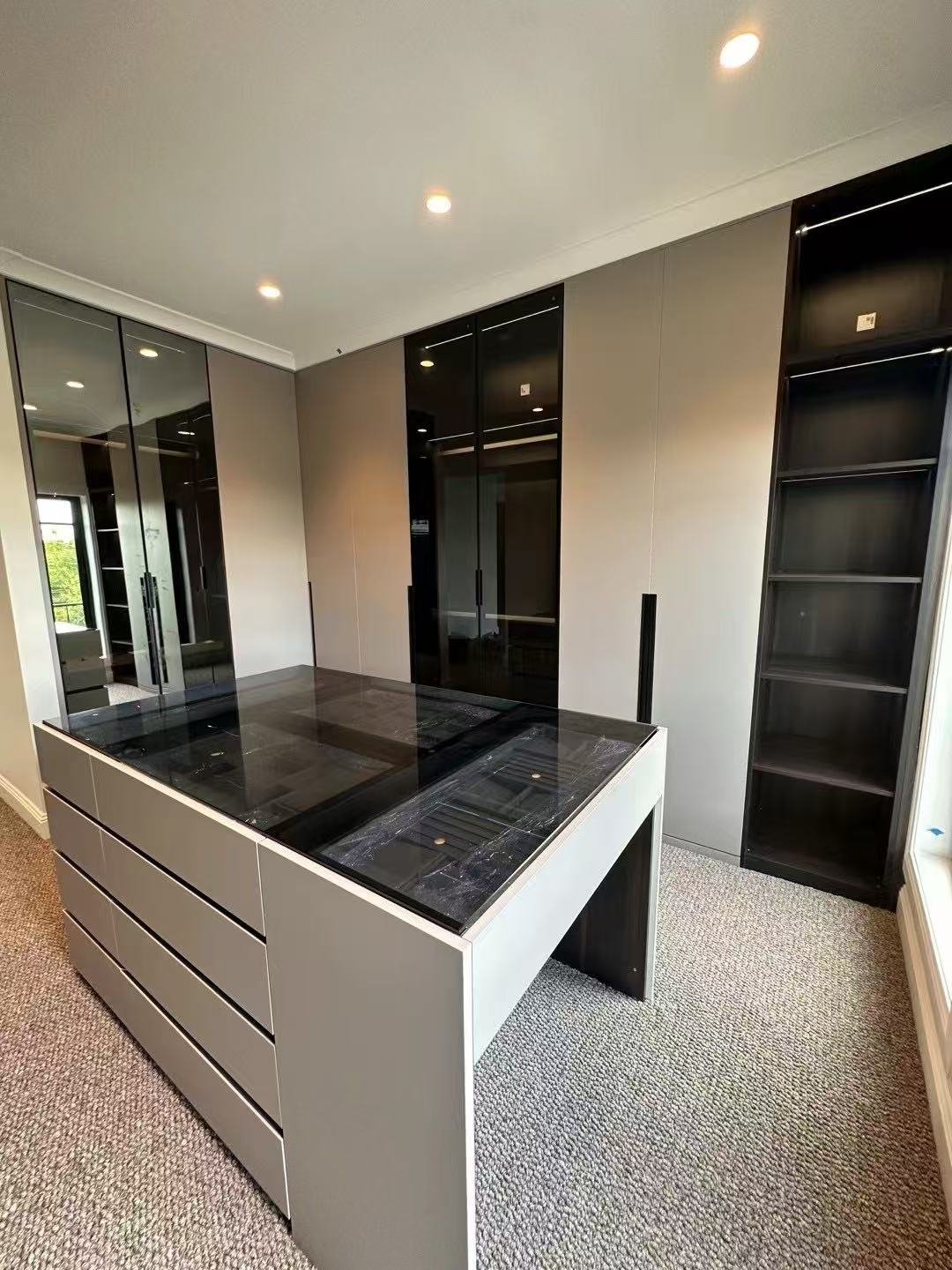 Walk-in wardrobe cabinetry with central island in Perth
